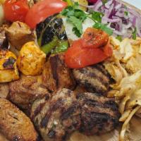 Mixed Grill Plate · Chicken adana kebab, chicken shish kebab, adana kebab, kofte and lamb chops. Served with ric...