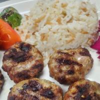 Turkish Style Meatballs · Traditional ground lamb and beef meatballs seasoned with onions, parsley and herbs. Chargril...
