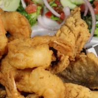 Shrimp (6 Pcs) & (2 Pcs) Fish · Six pieces of shrimp with two pieces of your choice of fish. Served with fries, coleslaw, an...