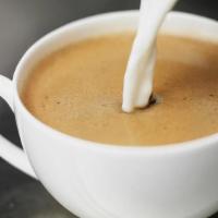 Café Au Lait · Our fresh brewed drip coffee with added steamed milk.  Similar to a Latte but made with brew...