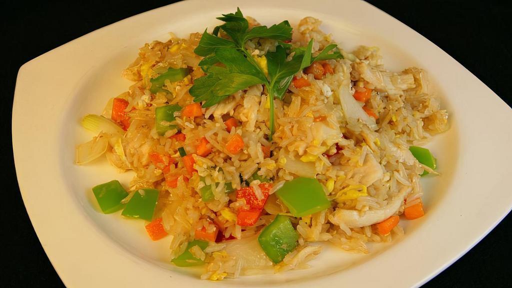 Fried Rice · Stir-fried rice with onion, carrots, scallions, bell pepper and egg in our homemade sauce.