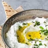 Tzatziki · Greek yogurt, cucumber, olive oil, mint, garlic and lemon juice served with pita bread.