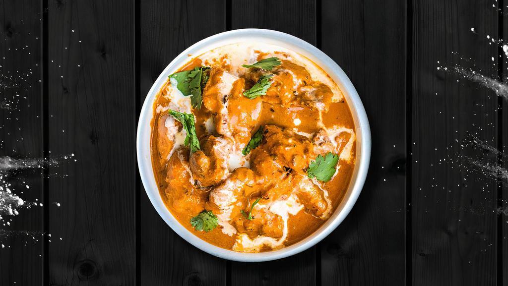 Creamy Butter Chicken  · Succulent pieces of chicken cooked in thick onion, tomato, and buttercream sauce with ground Indian spices and finished with cream and fenugreek leaves. Served with a side of aromatic white rice.