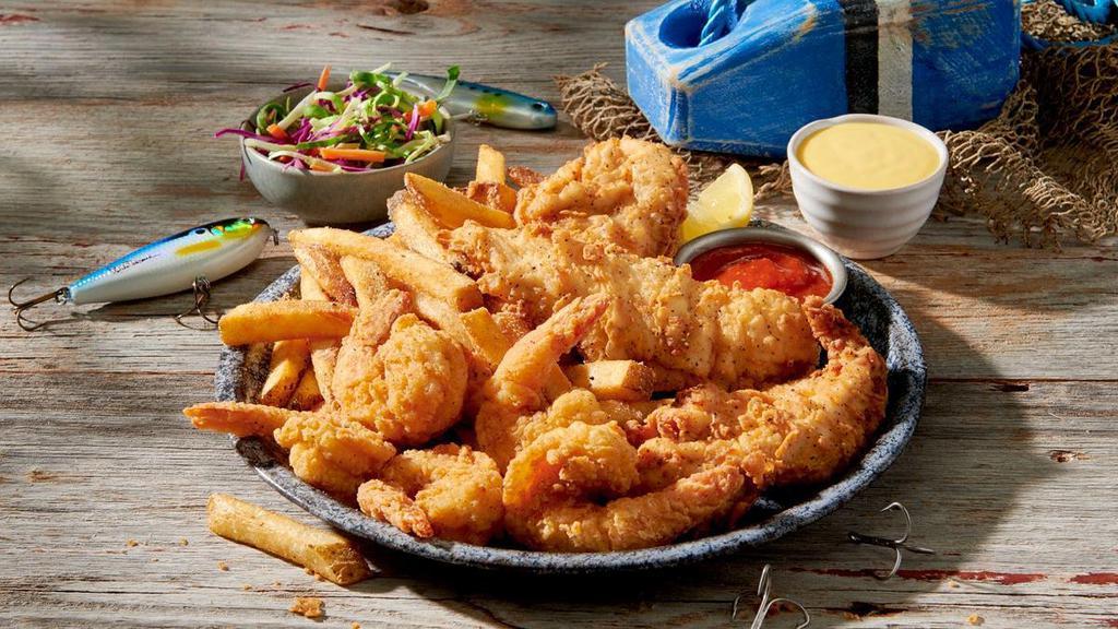 The Shrimp Boat Combo · Crispy, tender shrimp along with tasty chicken tenders dipped in buttermilk and fried to a perfect golden brown, served with cocktail and honey mustard sauces, French fries and coleslaw. Doesn’t all that float your boat?