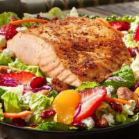 Caribbean  Salmon Salad · A wonderfully seasoned 6-oz. salmon fillet served on a bed of iceberg and romaine lettuces a...