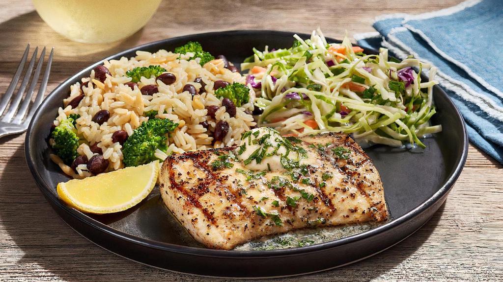 Basil Butter Mahi · A perfectly grilled 8-oz. Mahi fillet lightly seasoned with lemon pepper, topped with savory basil butter. Serve with choice of two sides.