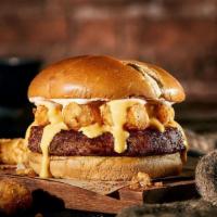 Bayou Burger · A nice, meaty Chuck Burger with seasoned tater tots, Cajun seasonings and Cajun mayo with ch...