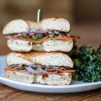 Lox Bagel · Lox carrot, homemade cream cheese, pickled onions, capers and dill comes with side kale salad
