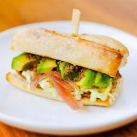 Choripan · beyond meat sausage on a fresh baked baguette, chimichurri, mustard aioli, pickled onions, a...