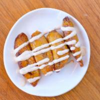 Cashew Cream Plantains · baked sweet plantains and a cashew cream drizzle GF
