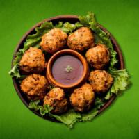 Seasoned Veggie Poppers  (Vegan) · A medley of onions hand made fresh to order then dipped in chickpea & rice flour batter and ...