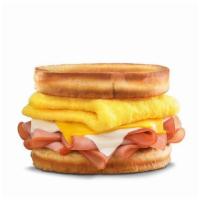 Frisco Breakfast Sandwich®  · Thinly sliced ham, folded egg,  American & Swiss cheeses on sourdough toast.. Breakfast serv...