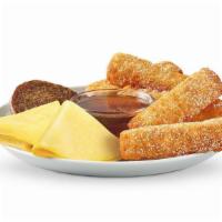 French Toast Dips® Platter  · 5-piece French Toast Sticks, sweetly sprinkled with powdered sugar, served with a side of sy...