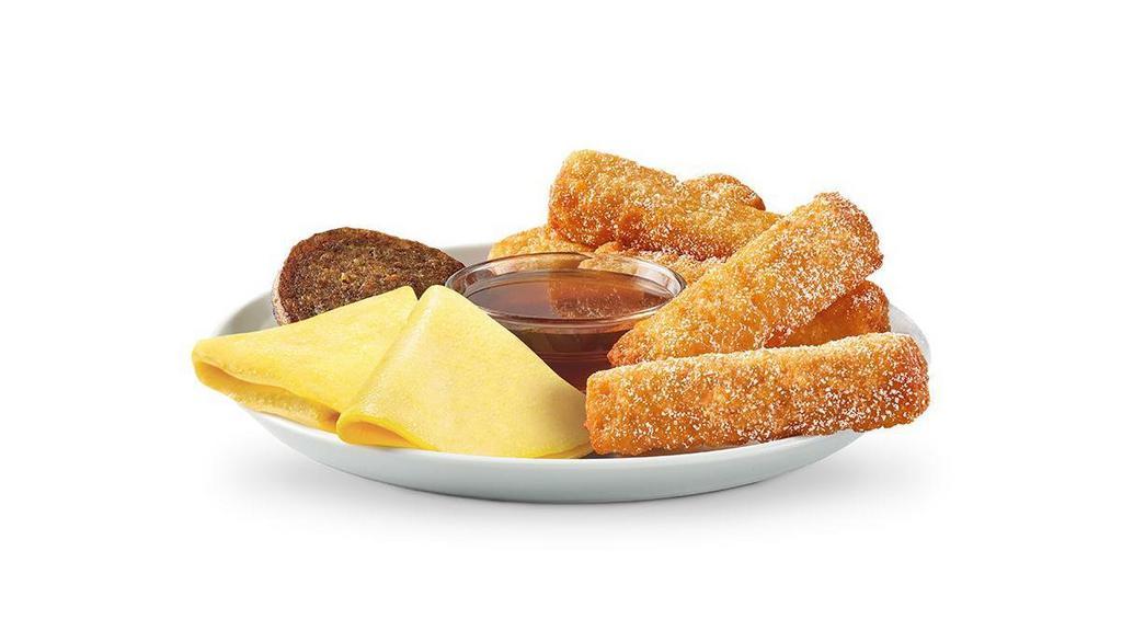 French Toast Dips® Platter  · 5-piece French Toast Sticks, sweetly sprinkled with powdered sugar, served with a side of syrup, 2 folded eggs, and a choice of sausage or bacon. .