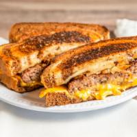 All American Patty Melt · 8 oz. angus chuck patty served on a butter grilled rye bread, melted American and Swiss chee...