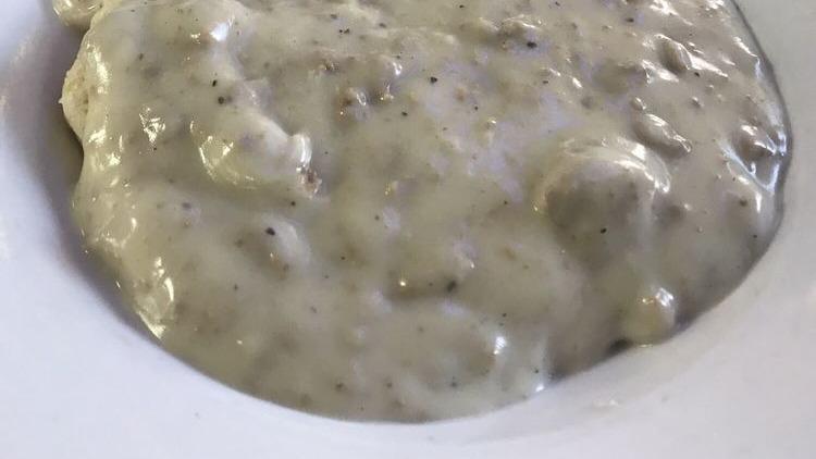Biscuits & Gravy · Simply the best. Homemade biscuits covered in our famous sausage gravy.