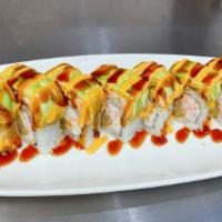 Green Dragon Roll · Eel, cucumber and avocado inside, topped with avocado with eel sauce.