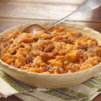 Sweet Potato Casserole · Sweet Potato Casserole with a crunchy pecan topping (14 day advance notice required).
