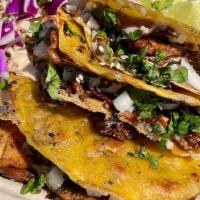 Quesatacos · 3 quesatacos with melted vegan cheese, cilantro, and diced onions. Choice of one protein on ...