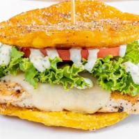 Toston Chicken · All natural chicken breast topped with jack cheese, lettuce, tomatoes, and cilantro sauce be...