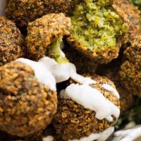 Falafels · Six Pieces. All starters are served with pita bread.