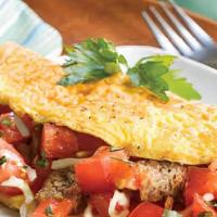 Aladdin Omelette · Eggs and omelette served with hash browns and pita bread.