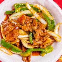 Pepper Steak · Stir fried steak with vegetables and a savory sauce.