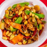 Kung Pao Chicken · Diced chicken in spicy brown sauce with hot red dried pepper and peanuts. Denotes spicy hot....