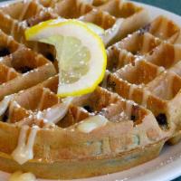 Blueberry Lemon Waffle  · Our signature Belgian waffle infused with blueberries and lemon, drizzled with cream cheese ...