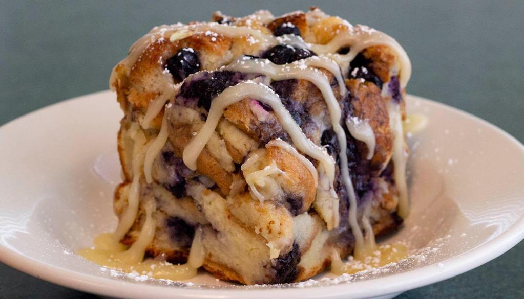 Blueberry Lemon Bread Pudding  · Our warm bread pudding, infused with blueberries and lemon, drizzled with cream cheese icing