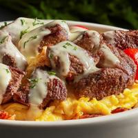 Steak & Scramble Bowl · Enjoy seasoned sirloin steak, scrambled eggs and roasted grape tomatoes served over hashbrow...