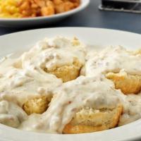 Biscuits & Sausage Gravy · Two buttermilk biscuits topped with our housemade sausage gravy, accompanied by two eggs any...