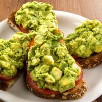 Avocado Toast · Fresh chopped avocado on eight-grain toast, with a side of fresh diced tomatoes ...add two e...