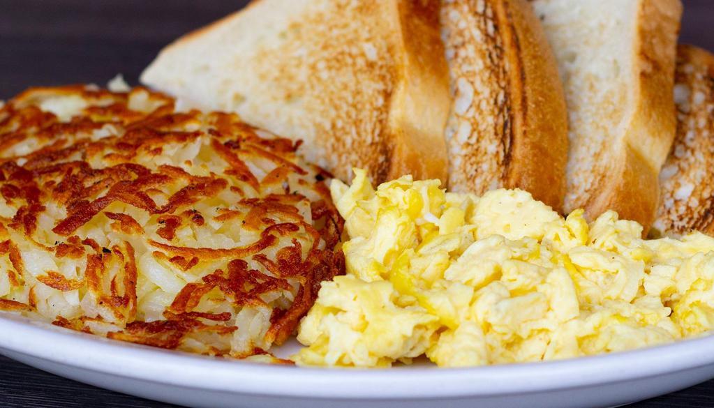 Eggs, Hash Browns & Toast · Two eggs any style, toast and hashbrowns or grits.