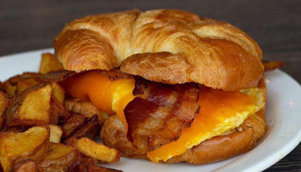 Bacon, Egg & Cheese Croissant* · Bacon, scrambled eggs and cheddar cheese.