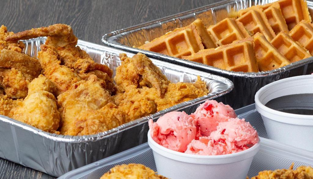 Fried Chicken & Waffles For 4 · Our famous fried chicken and Belgian waffles. Served with sweet, strawberry butter and signature sweet and spicy sauce.