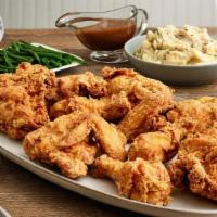 Fried Chicken For 4 · Our signature fried chicken, signature sweet and spicy sauce, creamy mashed potatoes and gre...