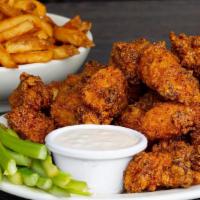 Boneless Wing Pack · 48 buttermilk marinated boneless wings, tossed in your choice of our signature Buffalo, Spic...