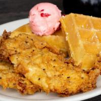 Kid’S Chicken & Waffle · Crispy tenders and a half of a regular Belgian waffle, topped with powdered sugar and sweet,...