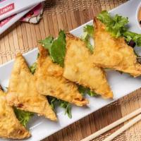 Crispy Crab Wontons · Stuffed with krabmeat and cream. cheese filling, studded with green. onion and jalapeño, and...