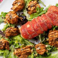 Rockin Lobster · Tails wins. Whole tempura lobster tail drizzled with our signature spicy-sweet-creamy headba...
