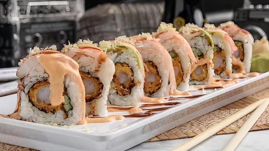 Sunset Strip Roll · Shrimp tempura and cucumber inside,. shrimp, crab stick and avocado outside—Hollywood-style. Topped with spicy mayo, eel sauce and crunchy flakes.