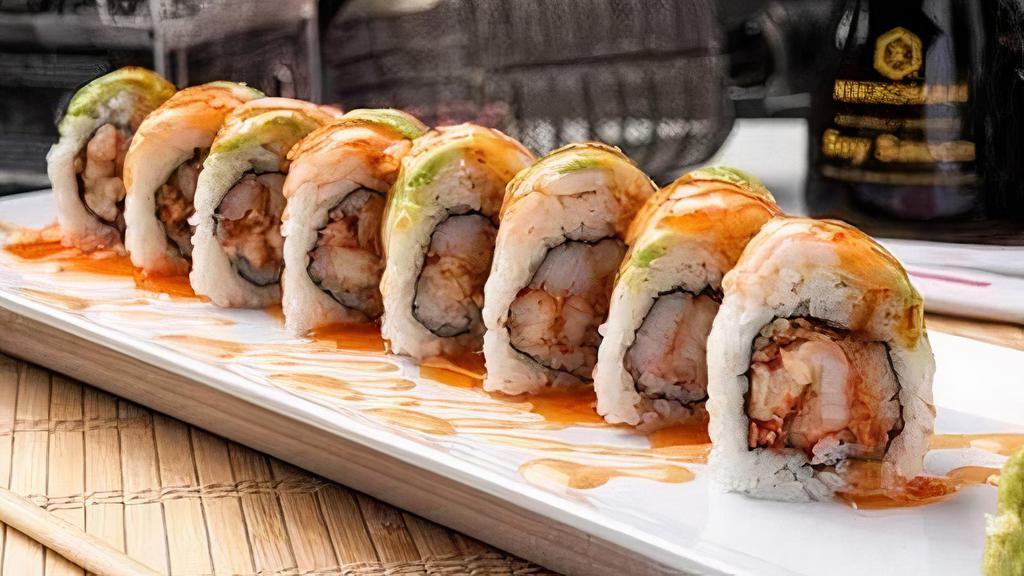 Reggae Roll · Because it doesn’t have to be rock, to be rock-n’-roll. Crab stick and Cajun-seasoned crawfish inside, shrimp and avocado outside, with spicy mayo and sweet chili.