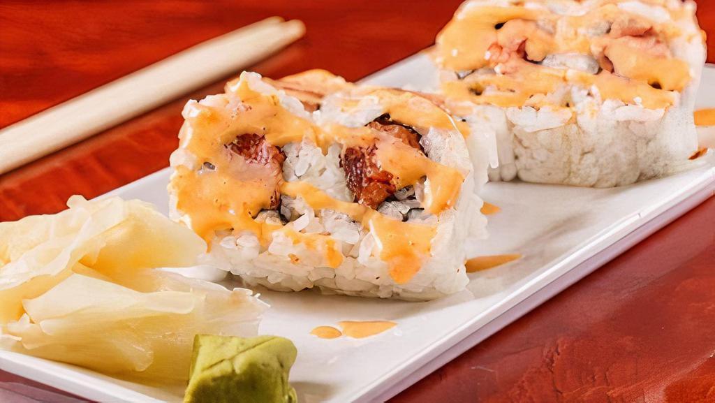 Spicy Tuna Roll · Chopped spicy red tuna inside, topped with spicy mayo.