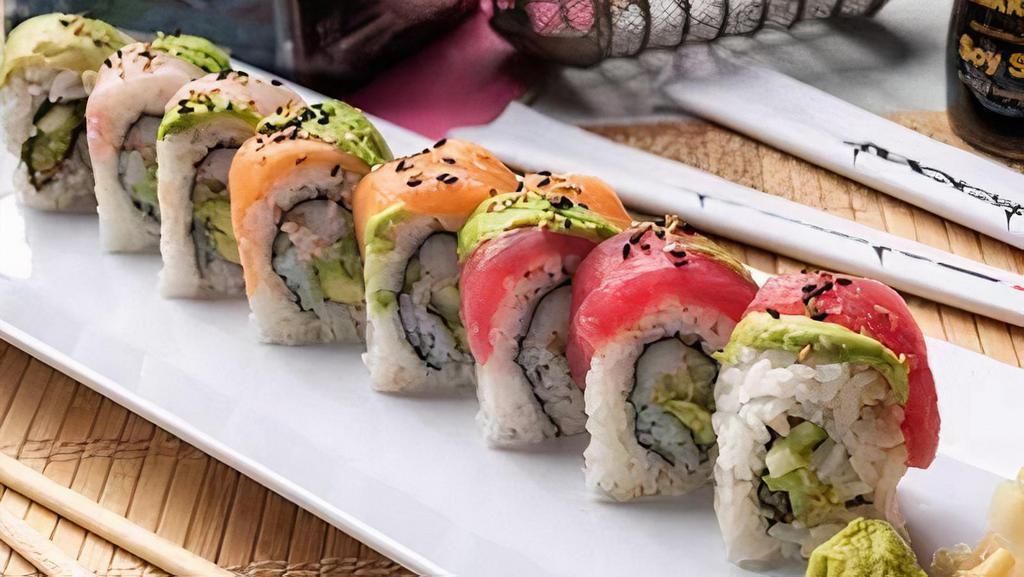 Rainbow Roll · California roll inside, red tuna, fresh salmon, yellowtail and avocado outside, topped with sesame seeds.