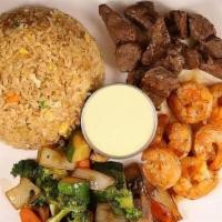 Filet Mignon And Shrimp · Served with soup or salad, fried rice, vegetables and yum-yum sauce
