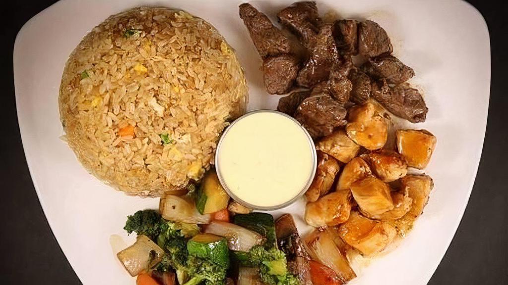 Filet Mignon And Chicken · Served with soup or salad, fried rice, vegetables and yum-yum sauce