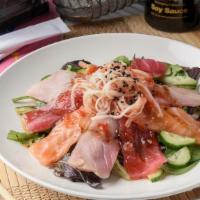Spicy Sashimi Salad · Three sashimi rockstars—red tuna, salmon, yellowtail—crab stick and  cucumber piled on sprin...