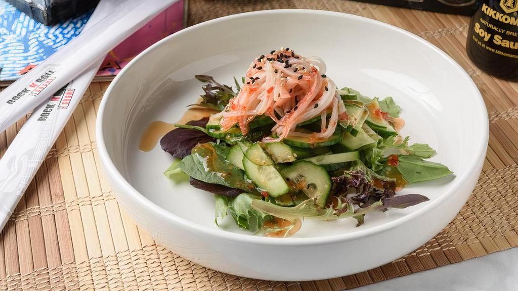 Cucumber Salad · Cool as a… You get it. Cukes and crab. stick glazed with sweet chili and ponzu sauce, piled on spring mix, topped with sesame seeds.