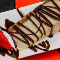 Cheesecake · (ORIGINAL OR FRIED) Creamy slice of. traditional cheesecake drizzled with chocolate and cara...